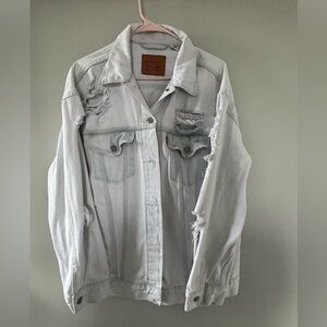 Levi’s Distressed White Denim Trucker Jacket